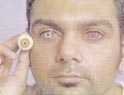 Alain de Zilva of Eyetech Optics, shows off the special-effects contact lenses.