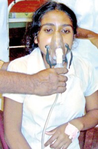 A student from Gampola receives oxygen