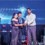 Group Managing Director of Informatics Mr.Hiran Wickramasinghe awarding Charani Vidarshana as the Winner of Solo Singing
