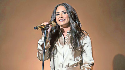 Demi Lovato opens up about pronouns, gendered bathrooms - Los Angeles Times