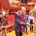 Lighting of the oil lamp by the Chairman of Royal Institute Mr. G.T. Bandara
