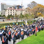 Many overseas students benefit ; Massey University Graduation March in Auckland.
