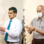 Lighting the oil lamp by Dr. Sameera R. Gunathilake, the senior lecturer CCS and Mr. N.I.N.S Nadarasa, the Senior Administrative Executive of IChemC.