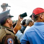 Battaramulla - Policeman takes a different shot