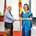 Mr. E G Somapala (Director/DLT) handing over the Token of Appreciation to the Chief Guest, Mrs. Deepika Seneviratne