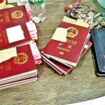A large cache of passports and mobile phones were found