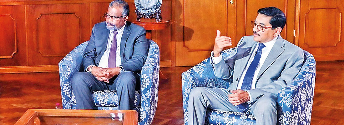Exiting default status next for Sri Lanka, CB Governor says