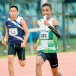 Benedictine Ishan Oshada leading  Under-16 4x100m relay