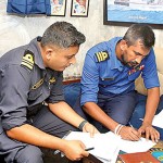 Navy personnel attend to formalities
