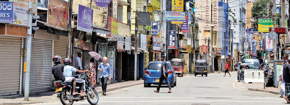 Many shops and eateries in Colombo closed on polls day, others run with skeletal staff