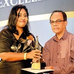 Best Health Care & Medical Reporter of the year: Nadia Fazlulhaq of the  Sunday Times receiving her award from Ranjith Ananda Jayasinghe, Editor Deshaya