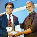 Business & Finance Journalist of the Year : Anantha Ganesha Sarma Swaminathan from Virakesari  receiving his award from Prabath Sahabandu, Island Editor