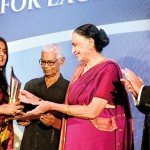 Mervyn De Silva Journalist of the Year:  Sulochana Ramiah of the Ceylon Today receiving her award from Chief Guest Savitri Goonesekere