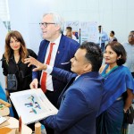 Dulana Ethugala presenting his final year project with the British High Commissioner to Sri Lanka, Andrew Patrick at Sri Lanka Design Festival 2024